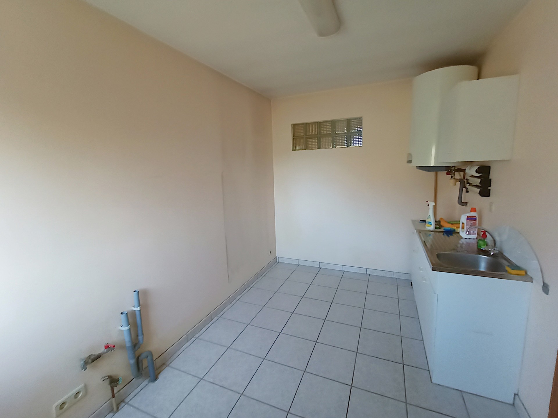 Washing room next to the kitchen